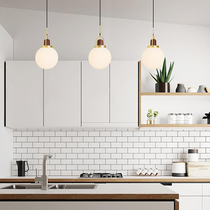 Opal Glass Ball Shade Pendulum Lamp Simple 1-Light Brass Pendant Light for Bedroom