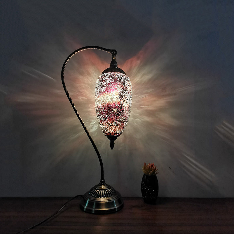 Lámpara de mesa de luz única, luz de vidrio elíptico de vidrio elíptico en bronce con brazo curvo