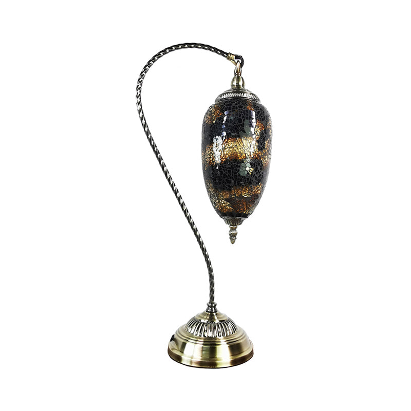 Lámpara de mesa de luz única, luz de vidrio elíptico de vidrio elíptico en bronce con brazo curvo