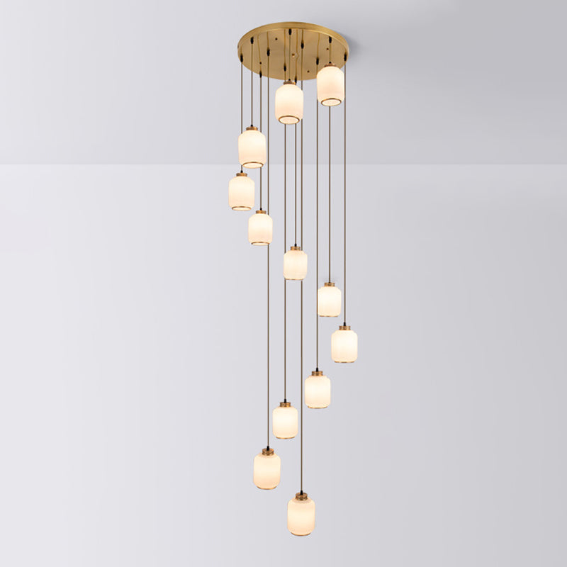 Weiße Glaszylindrische multi-Licht-Anhänger zeitgenössische Messingdecke für Treppen