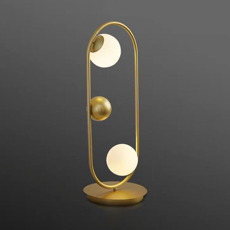 Lampada da tavolo decorativa per la casa in stile postmoderno in vetro opale con linee metalliche, lampada da comodino per camera da letto