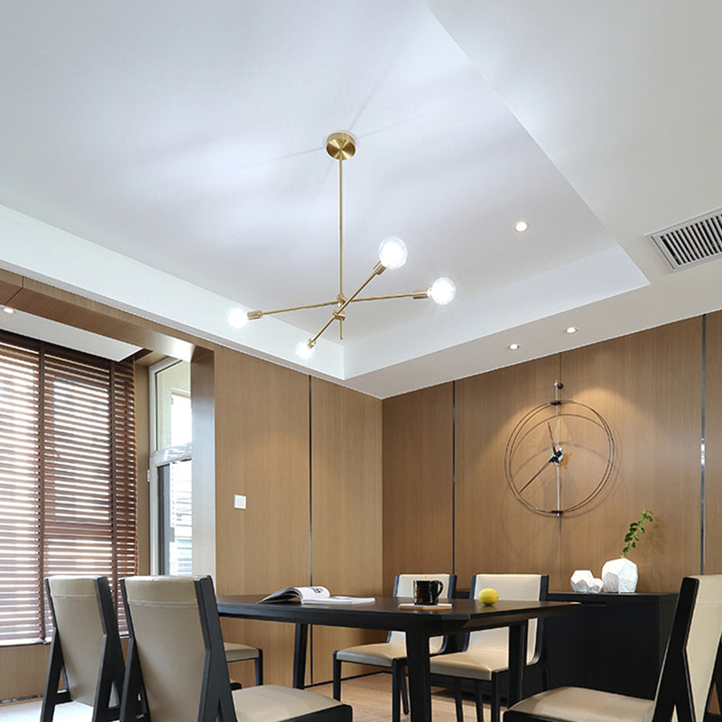 Illuminazione a sospensione incrociati regolabile contemporanee metalliche 4 lampadine lampadario oro lampadario con tonalità di globo di vetro trasparente