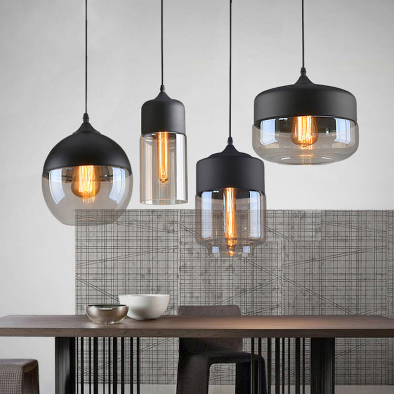 Lumière suspendue géométrique à 1 lumière dans le pendentif en fer forgé industriel de style vintage avec une teinte en verre