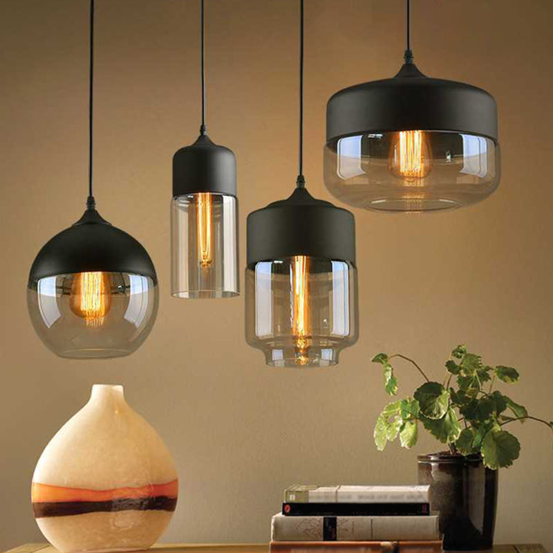 Lumière suspendue géométrique à 1 lumière dans le pendentif en fer forgé industriel de style vintage avec une teinte en verre