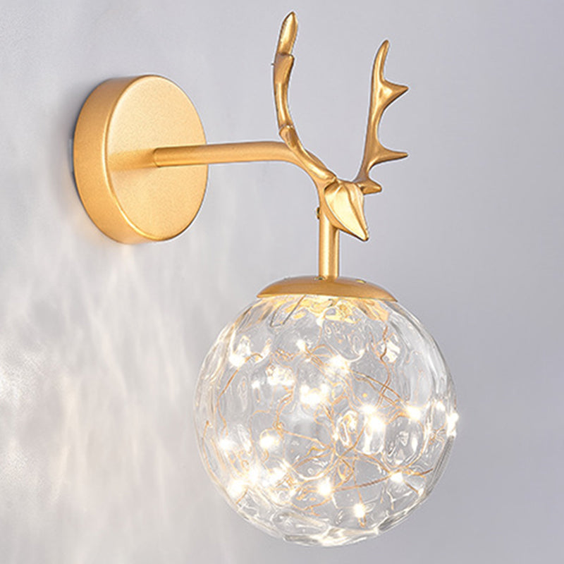Glass Globe Wall Sconce in Modern Luxury Style Wrought Iron Wall Lamp with Antler Decoration
