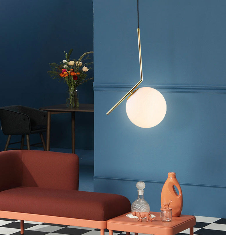 Brass Globe Single Pendant Light in Modern Creative Style Wrought Iron Hanging Lamp with Glass Shade