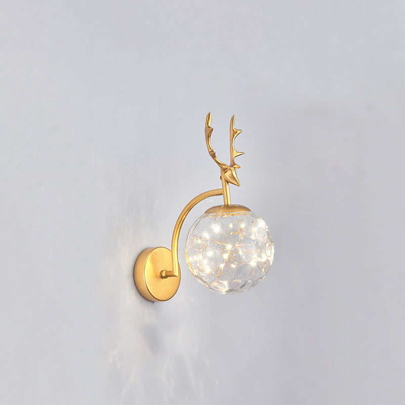 Glass Globe LED Wall Lamp in Modern Fashionable Wrought Iron Wall Sconce with Antler Decoration