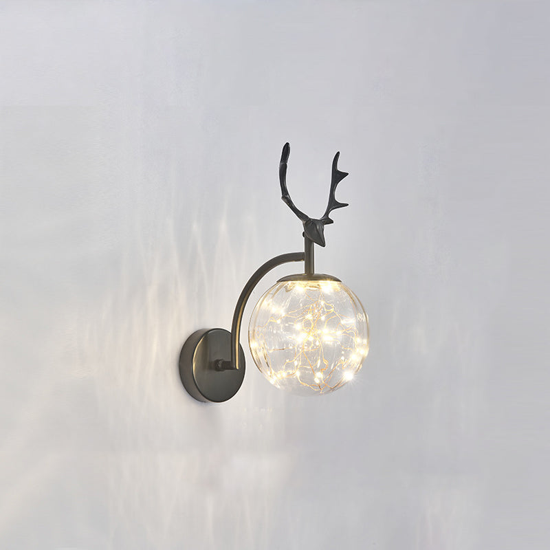 Glass Globe LED Wall Lamp in Modern Fashionable Wrought Iron Wall Sconce with Antler Decoration