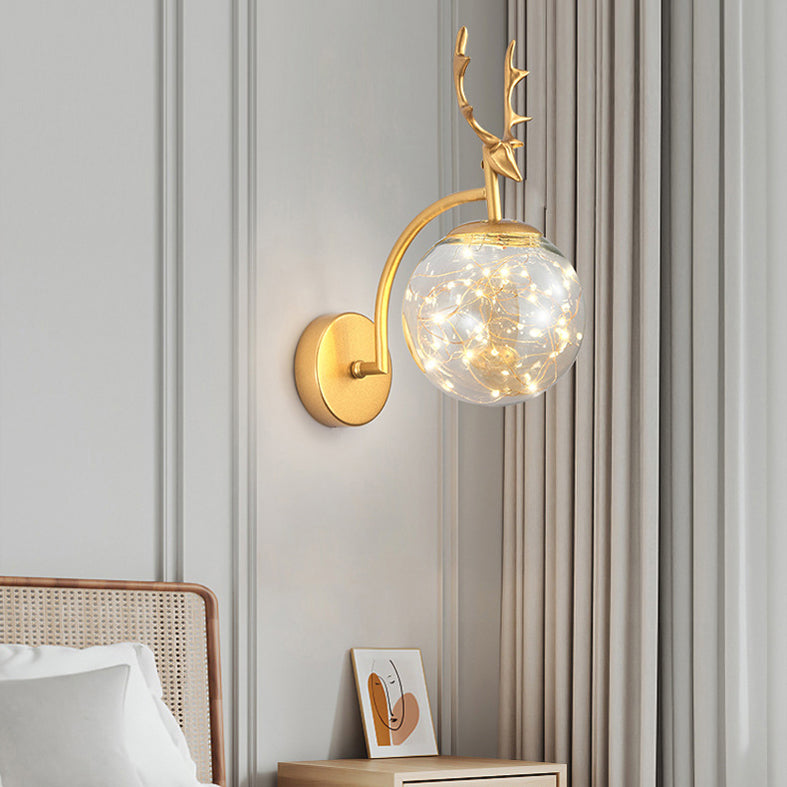 Glass Globe LED Wall Lamp in Modern Fashionable Wrought Iron Wall Sconce with Antler Decoration