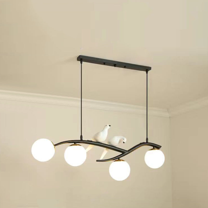 Glass Globe Island Light in Modern Singularity Wrought Iron Pendant Light with Resin Bird Decoration