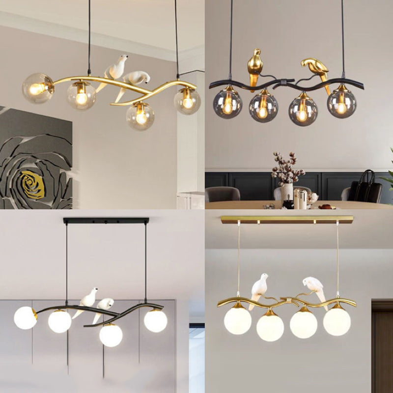 Glass Globe Island Light in Modern Singularity Wrought Iron Pendant Light with Resin Bird Decoration