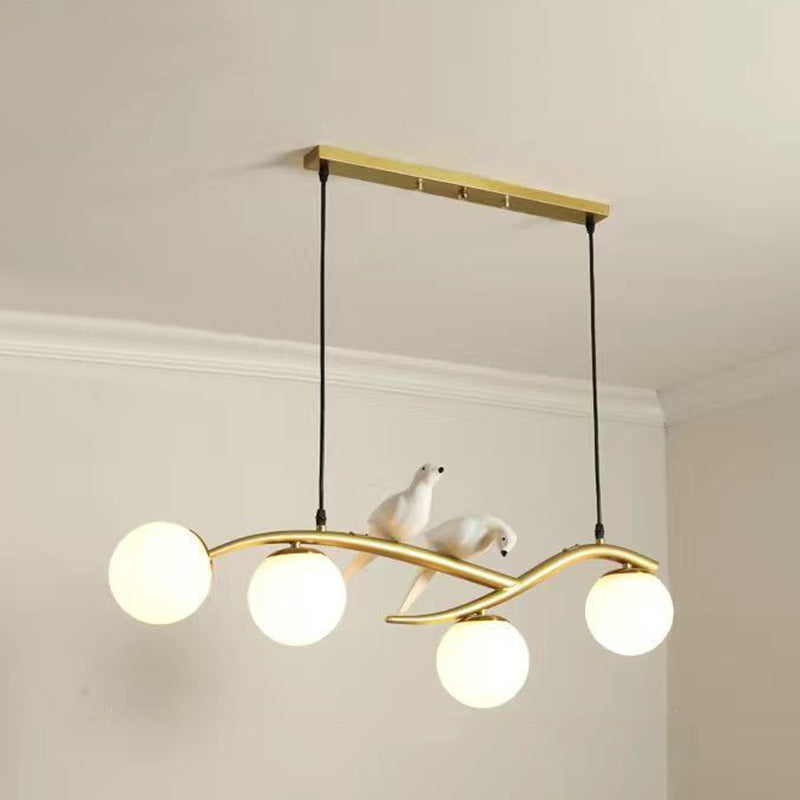 Glass Globe Island Light in Modern Singularity Wrought Iron Pendant Light with Resin Bird Decoration