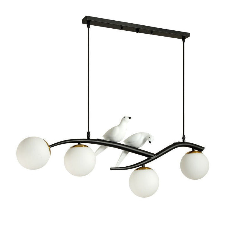 Glass Globe Island Light in Modern Singularity Wrought Iron Pendant Light with Resin Bird Decoration