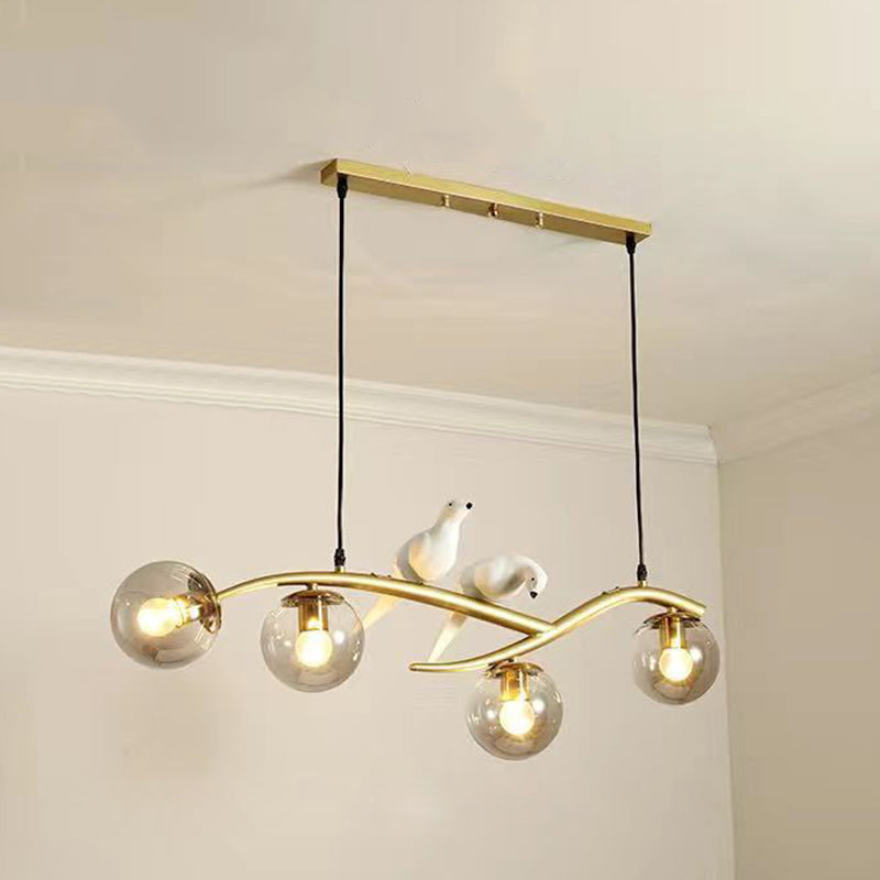 Glass Globe Island Light in Modern Singularity Wrought Iron Pendant Light with Resin Bird Decoration