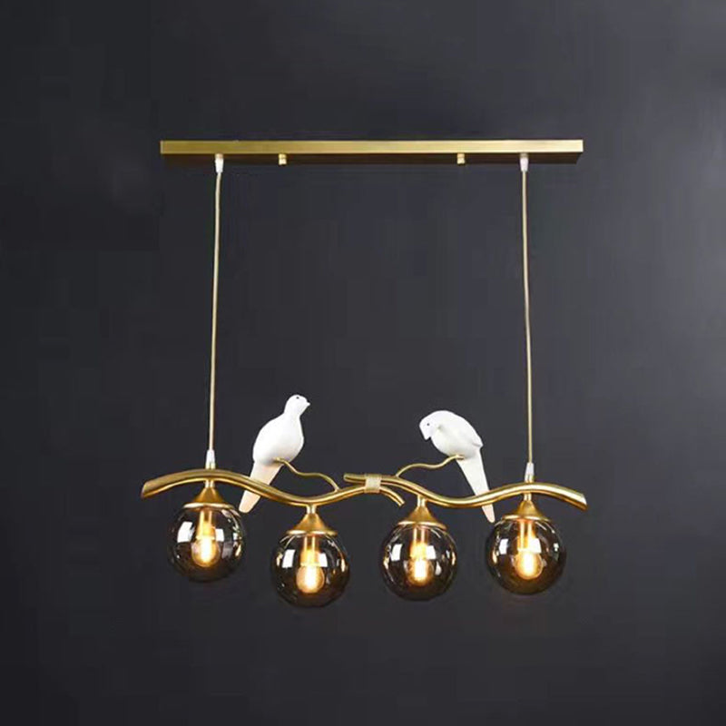 Glass Globe Island Light in Modern Singularity Wrought Iron Pendant Light with Resin Bird Decoration