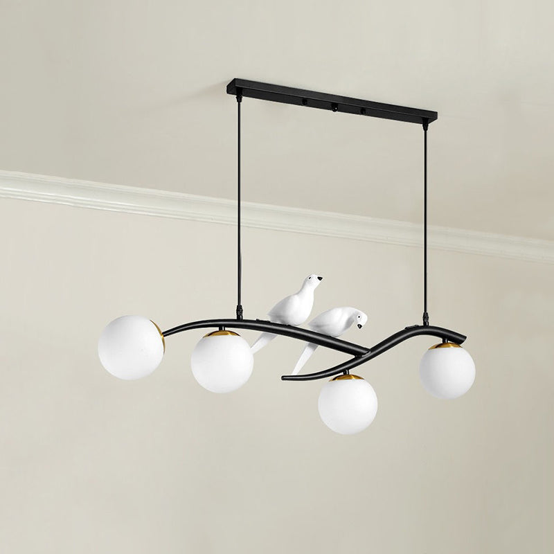 Glass Globe Island Light in Modern Singularity Wrought Iron Pendant Light with Resin Bird Decoration