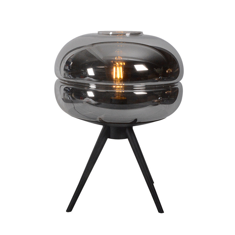 Postmoderne UFO-förmige Glas Tischlampe Single-Bulb-Nachttischlicht mit Quadpod
