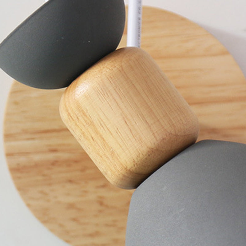 Luz de pared individual geométrica de macarrón en una lámpara de pared de madera de simplicidad moderna con sombra de hierro forjado
