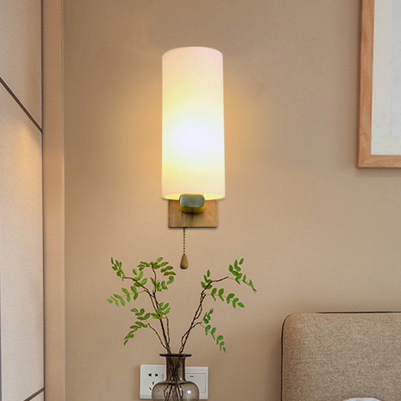White Glass Cylinder Sconce Light Modern 1 Bulb Wall Mount Lighting with Rectangle Wood Backplate