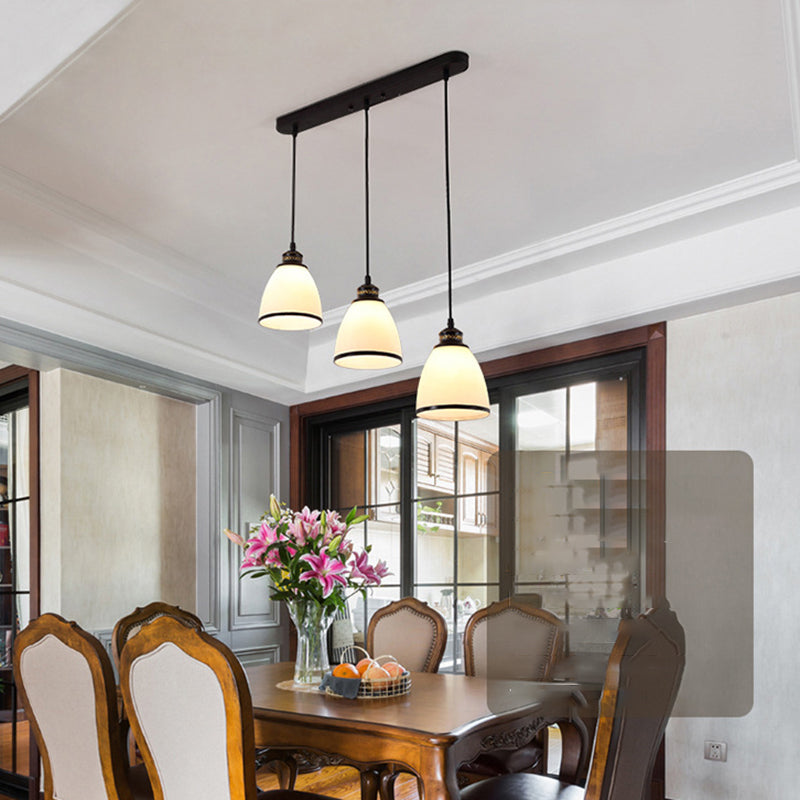 Lumière pendante noire à 3 légers en dôme en fer forgé moderne lampe suspendue avec une teinte en verre