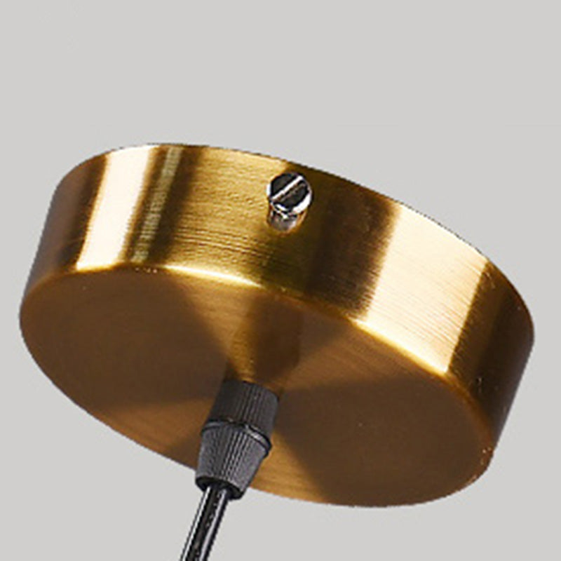 Salle à manger trois têtes forme de sphère suspendue en verre clair et métal moderne