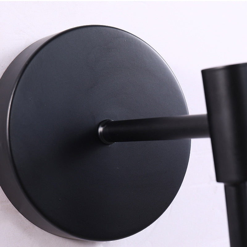 Luz de pared colgante de hierro forjado en una moderna lámpara de pared de vidrio de globo creativo para el dormitorio