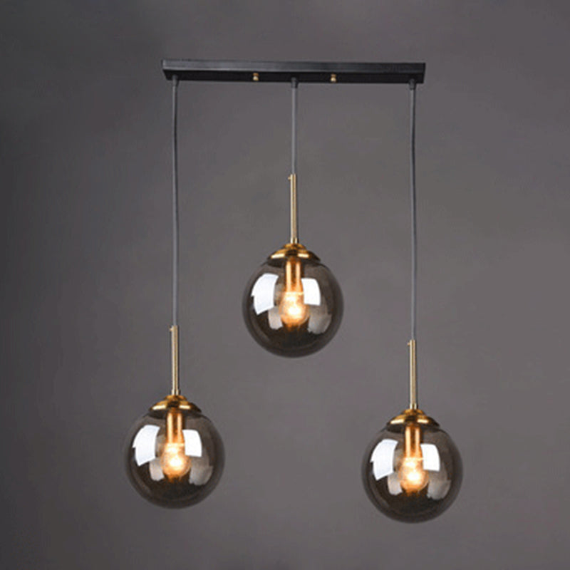 Globe Glass Hanging Lamp in Modern Creative Style Electroplate Metal Pendant Light for Dining Room
