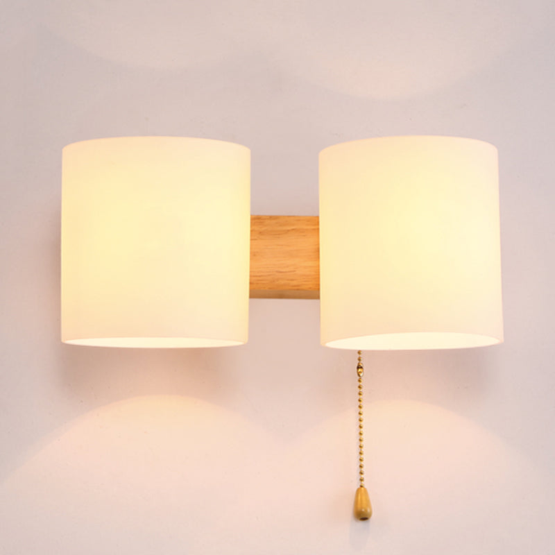 Application murale cylindroïde en bois dans la lampe murale en verre blanche de style concis moderne dans la couleur du journal