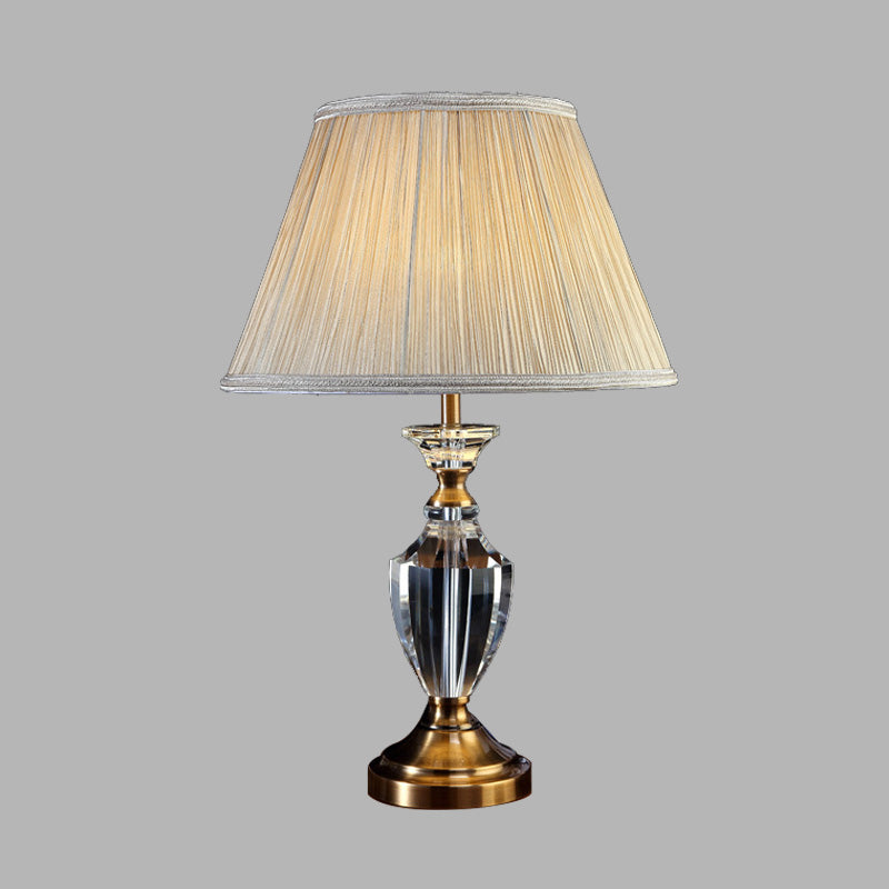 Tombre de tela Tombra plisada Luz de noche de estilo tradicional 1 Lámpara de mesa de dormitorio ligero en gris crema con base de cristal de urna