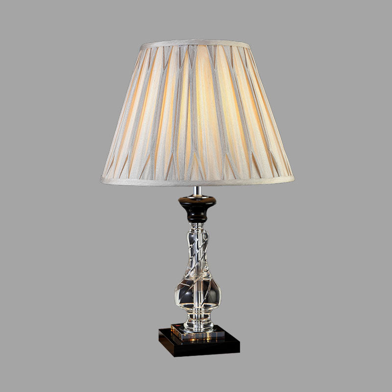 Lámpara de mesita de noche Minimalism Bell, 1 luz nocturna de tela ligera en gris crema con base de cristal translúcido