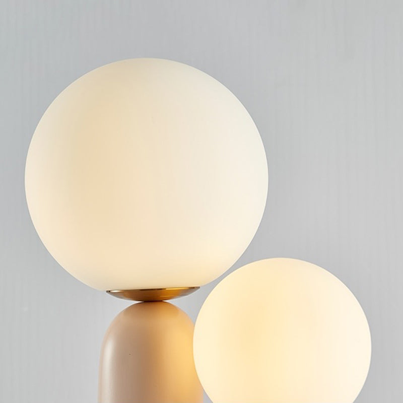 Lumière de table rose à 2 lumières dans la lampe de table en résine laquée de style créatif moderne avec nuance de verre globe