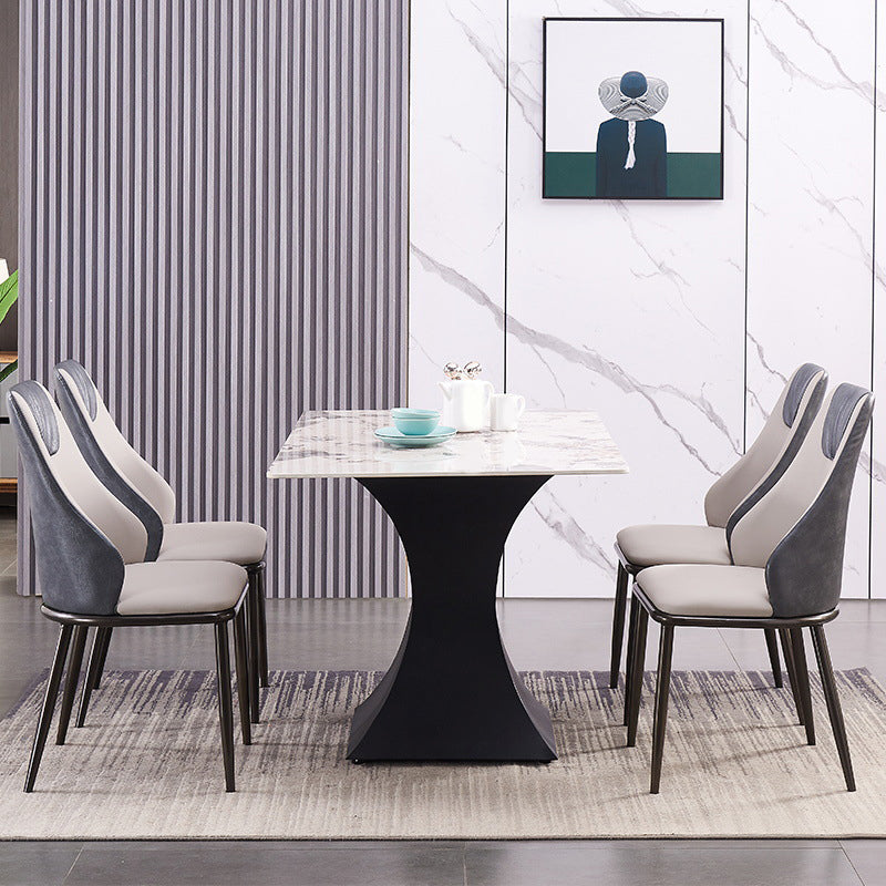 Moderne Metallflügelback -Stuhl -Leder -Essstühle mit schwarzen Beinen
