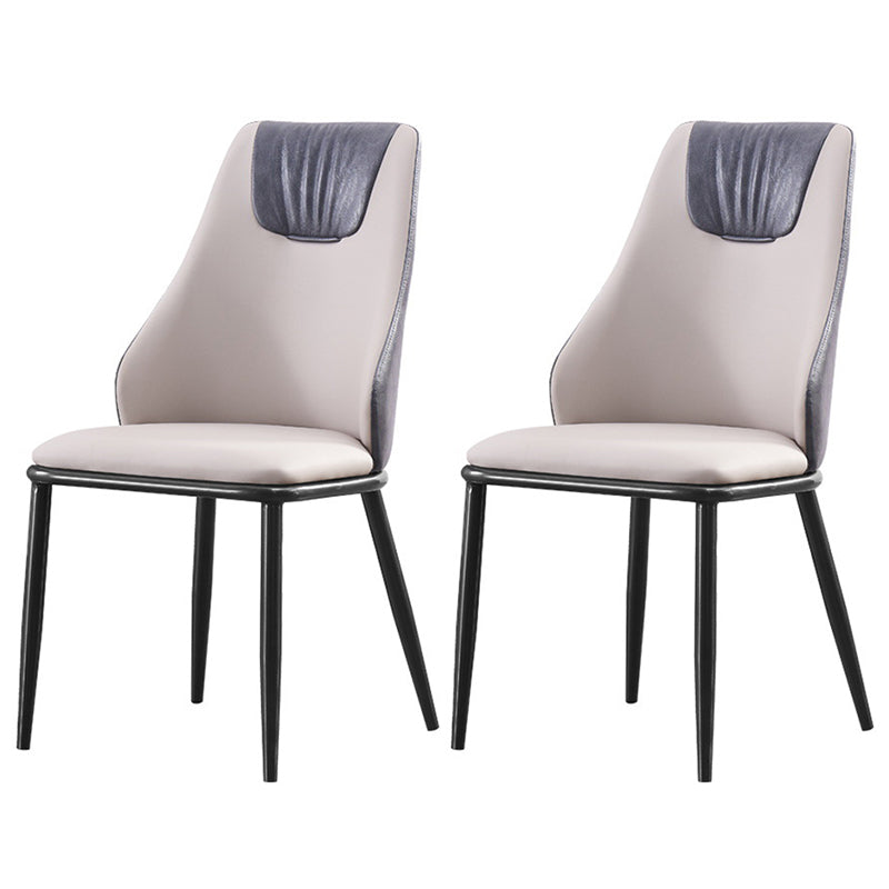 Moderne Metallflügelback -Stuhl -Leder -Essstühle mit schwarzen Beinen