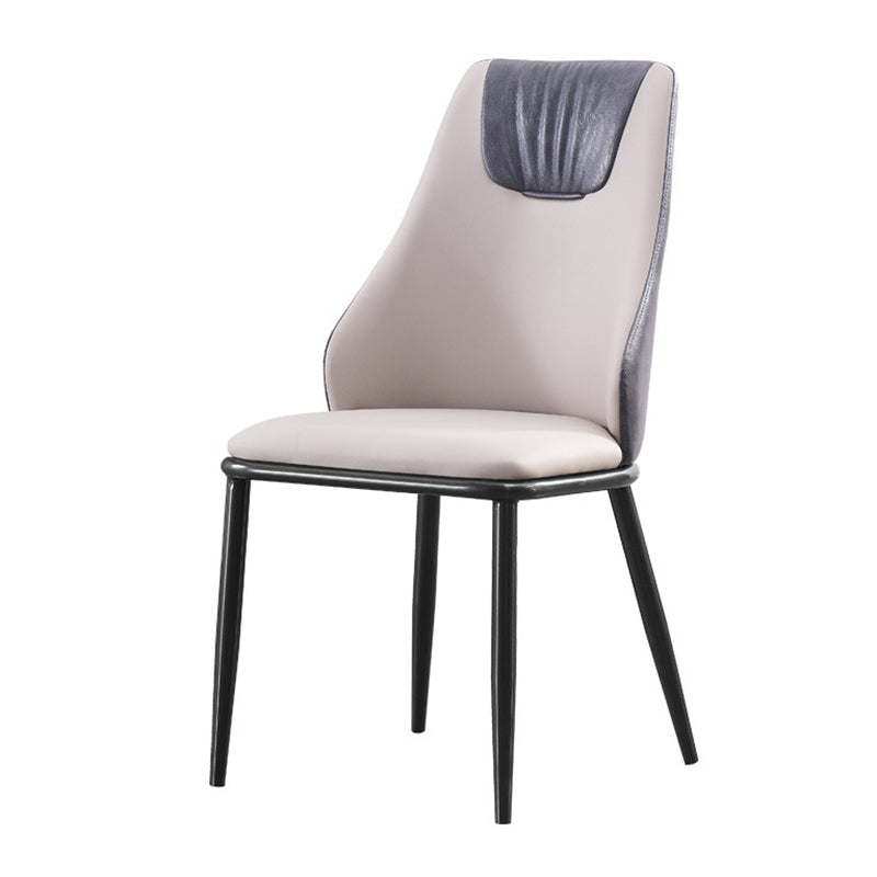 Moderne Metallflügelback -Stuhl -Leder -Essstühle mit schwarzen Beinen