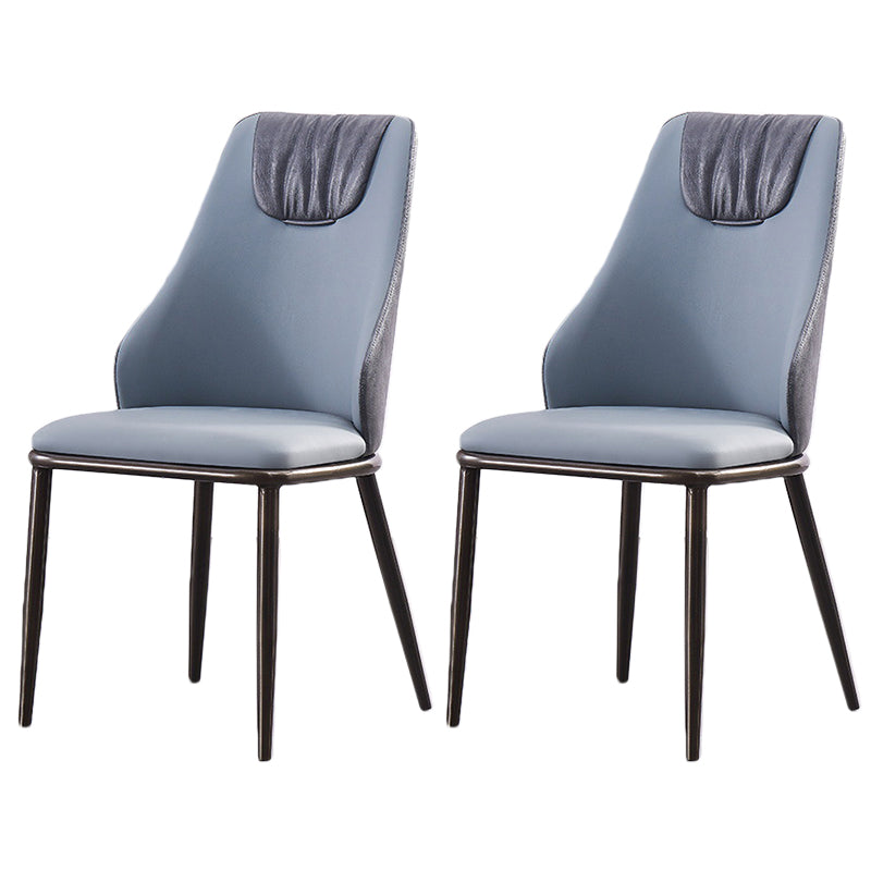Moderne Metallflügelback -Stuhl -Leder -Essstühle mit schwarzen Beinen
