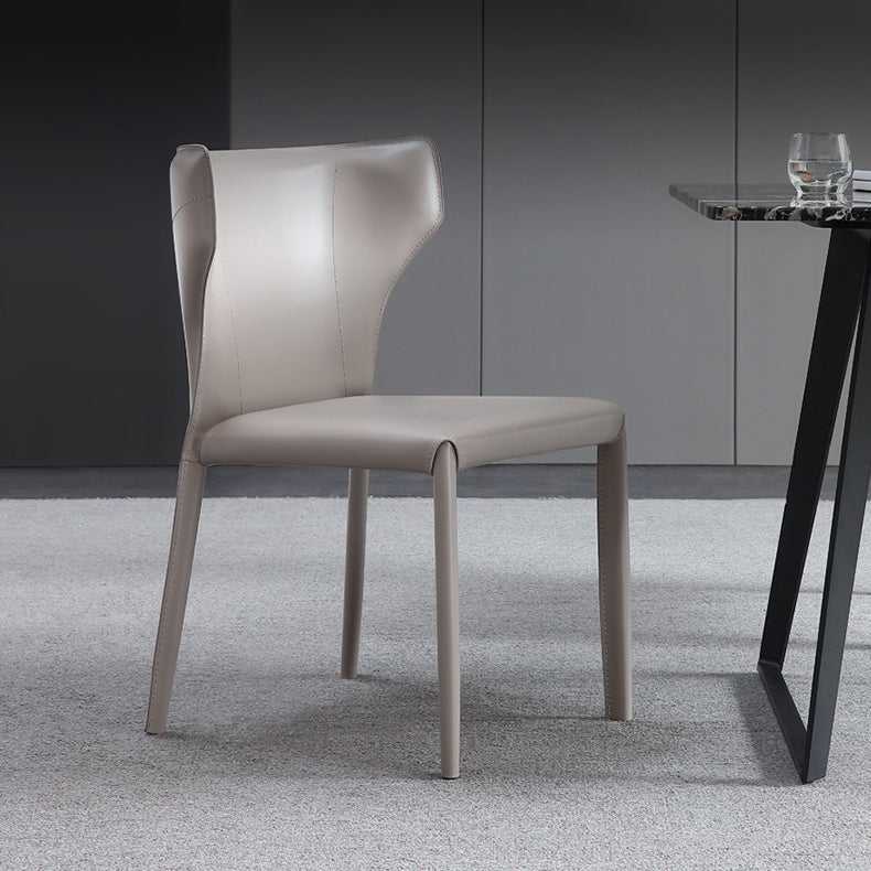Moderner Wingback Side Stuhl Leder armlosen Essstuhl mit Metallbeinen