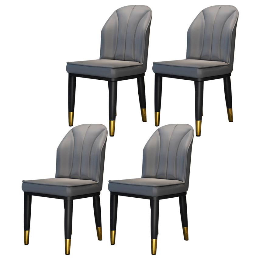 La salle à manger contemporaine en métal préside les chaises latérales à oreilles de finition métallique