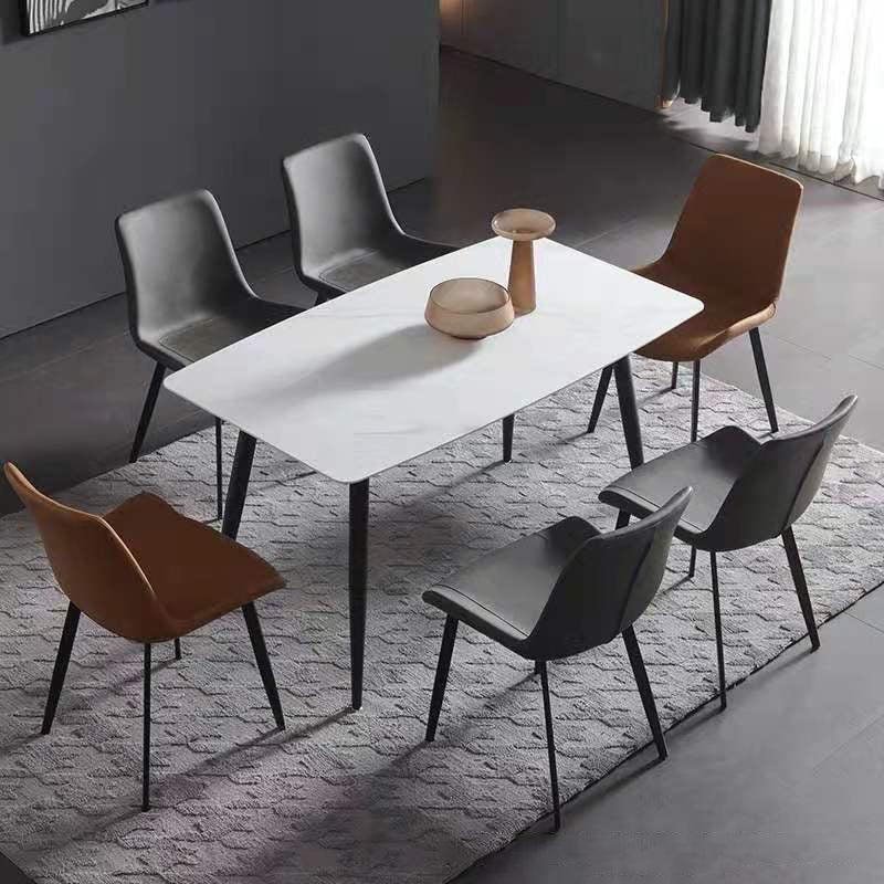 Salle à manger Ensemble moderne avec table à manger en pierre fritte et chaises rembourrées