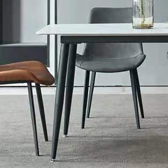 Salle à manger Ensemble moderne avec table à manger en pierre fritte et chaises rembourrées