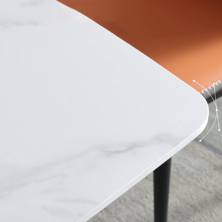 Table de table contemporaine avec table en pierre fritte et chaises rembourrées