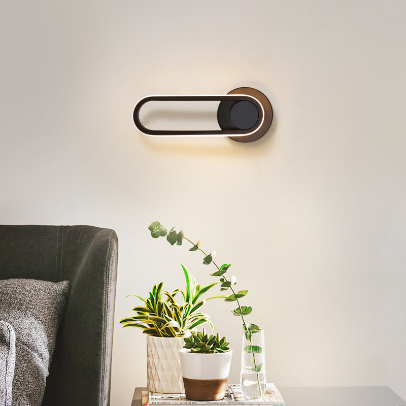 Lacquered Iron Black LED Wall Sconce in Modern Concise Style Silicone Oval Rotatable Wall Lamp