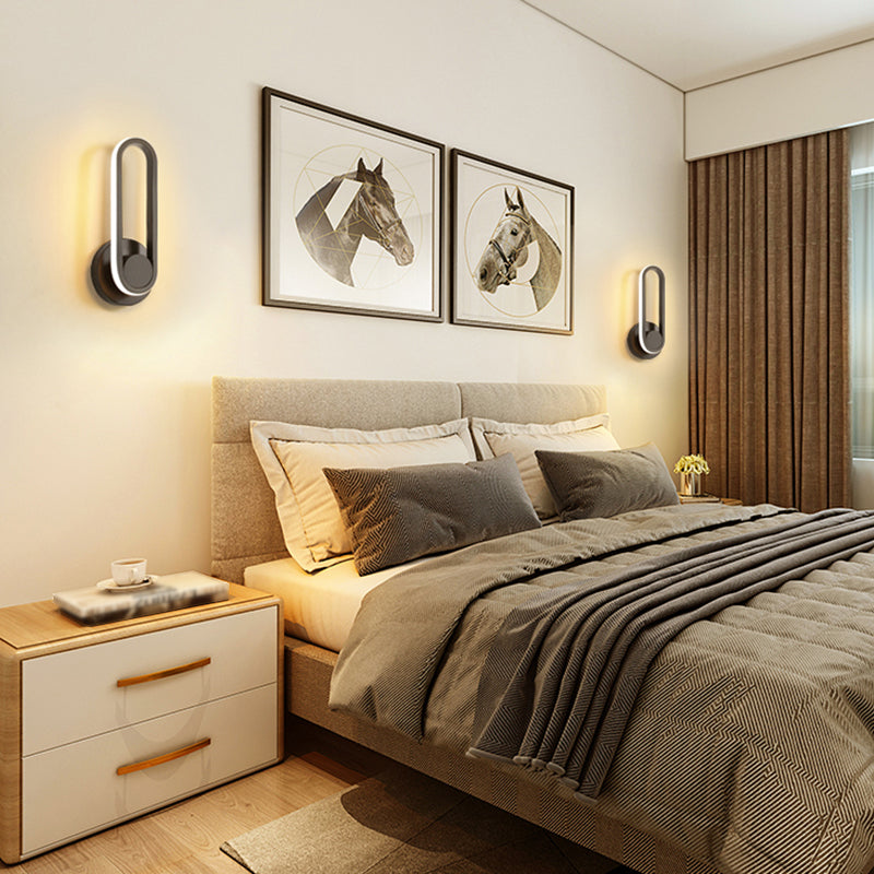 Lacquered Iron Black LED Wall Sconce in Modern Concise Style Silicone Oval Rotatable Wall Lamp