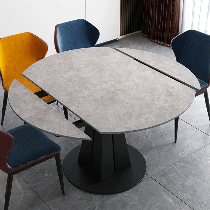 Table à manger en pierre fritrée de style moderne avec piédestal