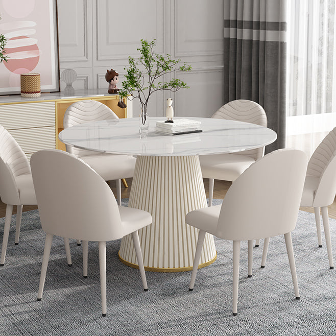 Stenen tafel in eigentijdse stijl, rond voetstuk, informele eettafel voor thuis