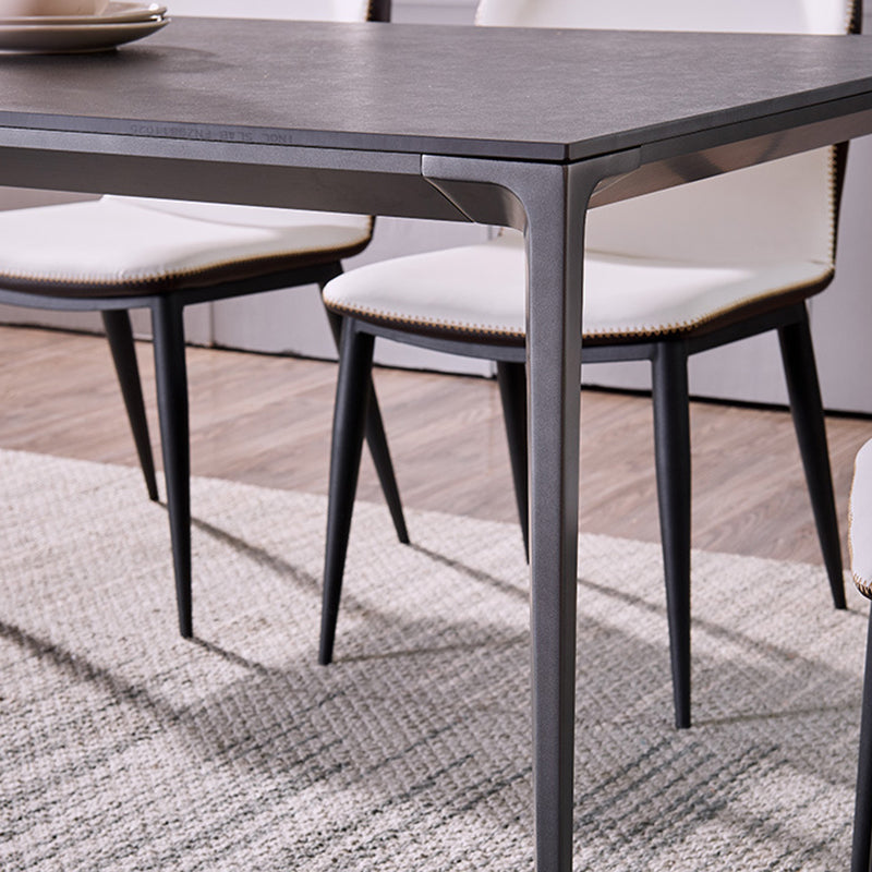 Simplicidad Mesa de comedor de piedra sinterizada Mesa rectangular con cuatro patas metálicas