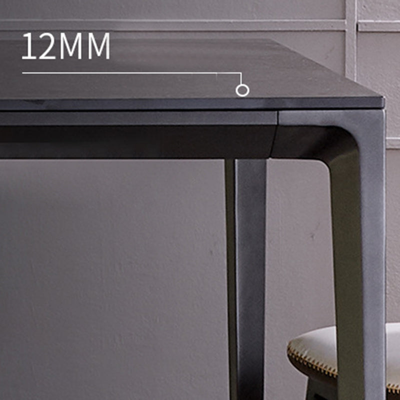 Simplicidad Mesa de comedor de piedra sinterizada Mesa rectangular con cuatro patas metálicas