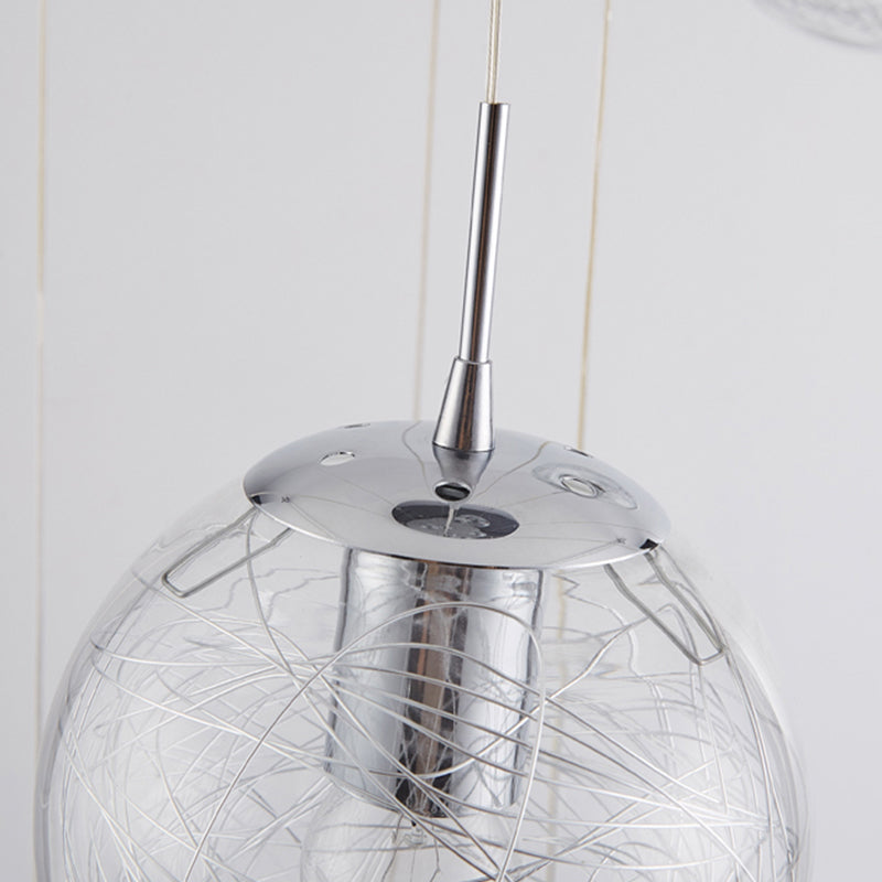 Lumière suspendue en argent dans la lampe suspendue du globe en acier inoxydable de style de luxe moderne pour les escaliers