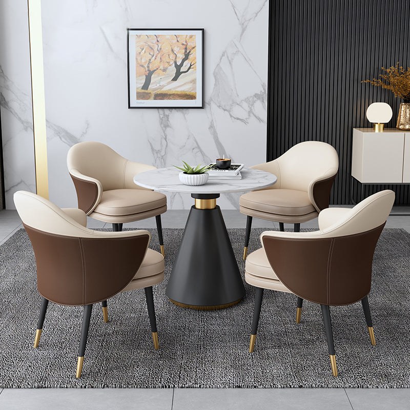 Eigentijdse stenen eettafel rond voetstuk huis keuken dinermeubilair