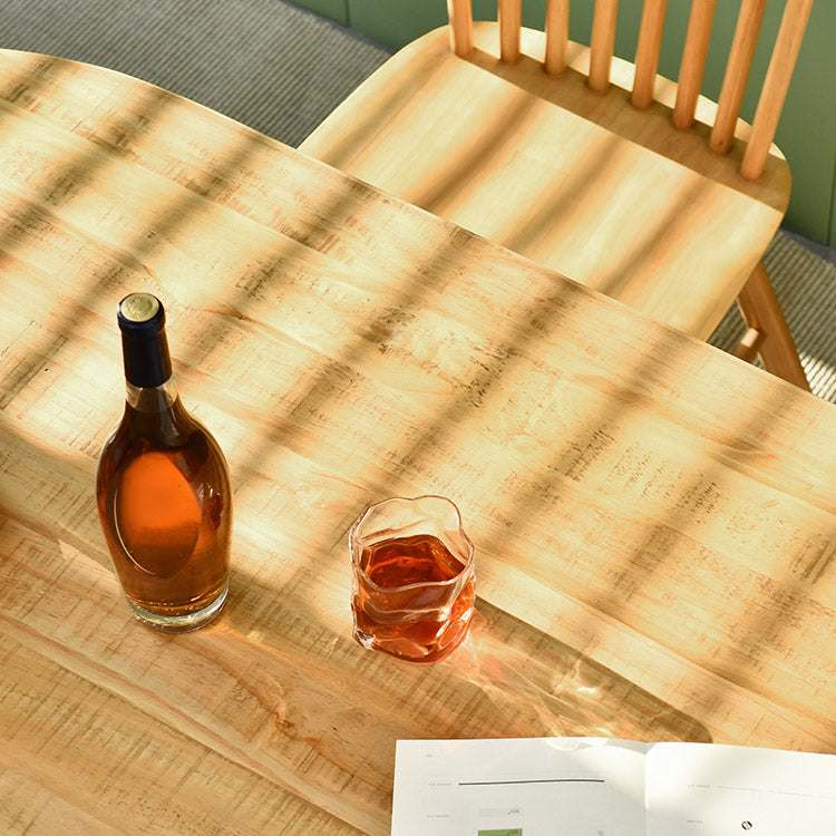 Zeitgenössischer Esstisch ovaler masser Holztisch mit metallischem vierbeinigen Tisch