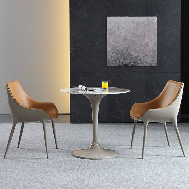 Ronde eigentijdse eettafel in bruintinten Vaste tafel van gesinterde steen
